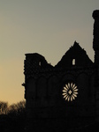 SX17397 Silhouette of wheel window Bishop's Palace.jpg